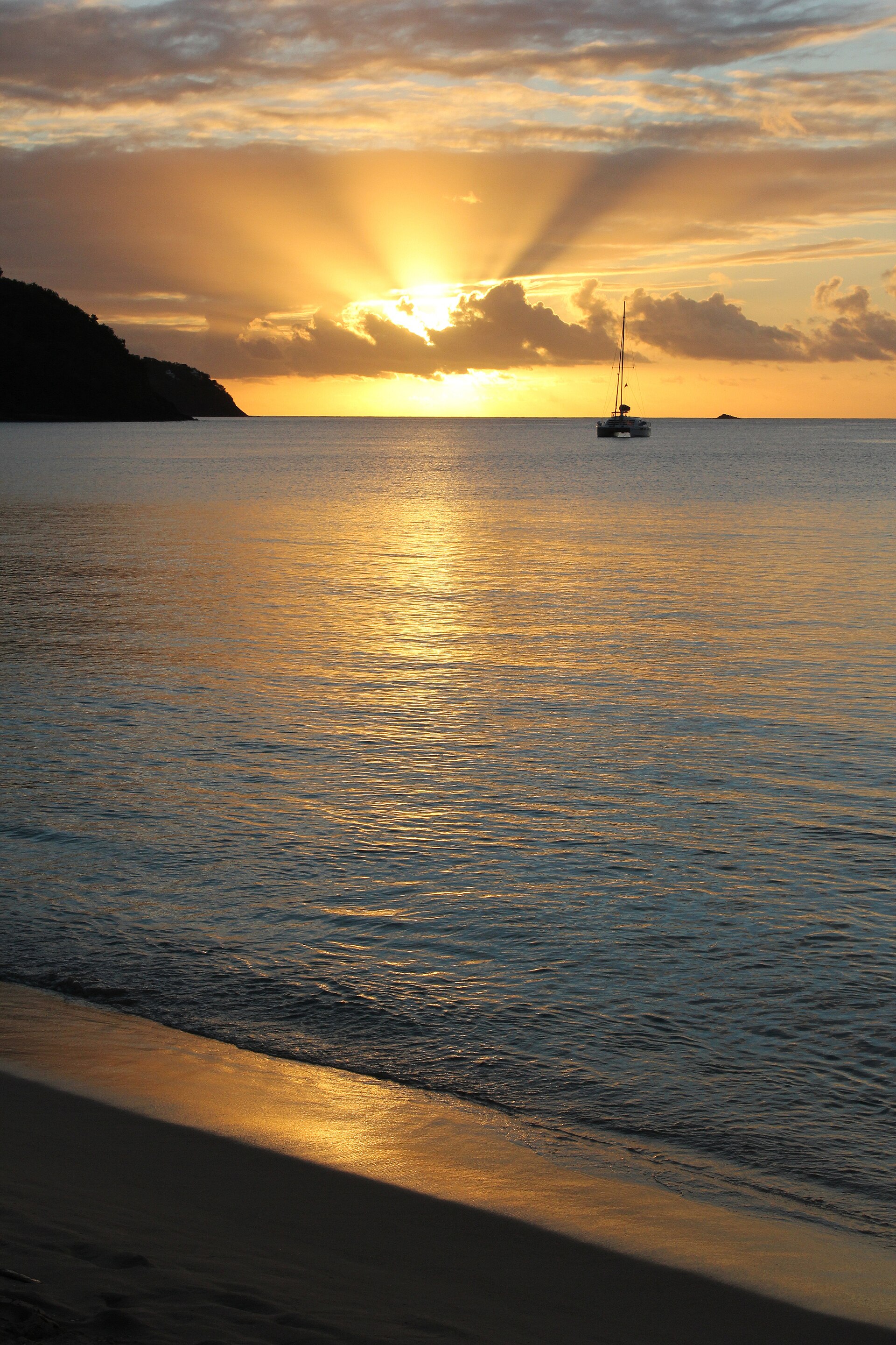 A palm-framed sunset over Rodney Bay, Saint Lucia